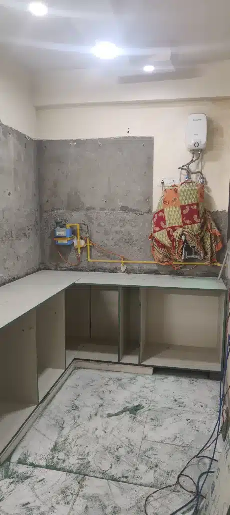 a space of modular kitchen with bottom cabinets