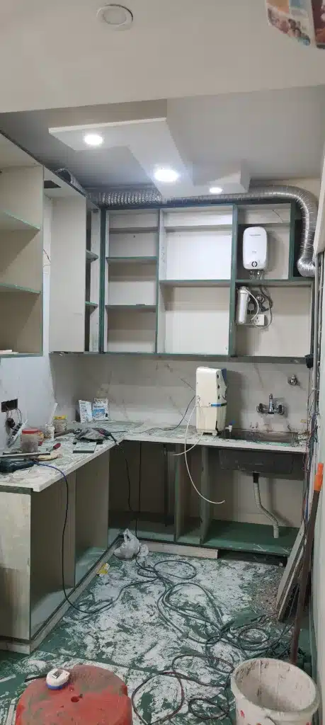 a image of a modular kitchen with boxes